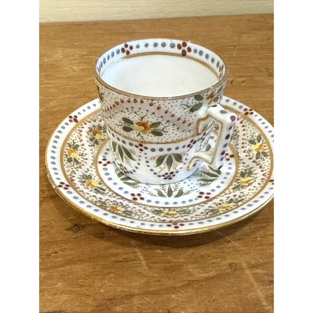 Antique Austrian demitasse cup and saucer hand painted floral gold trim